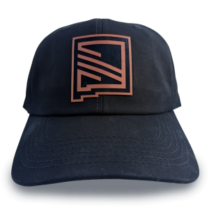 black hat with engraved leather patch