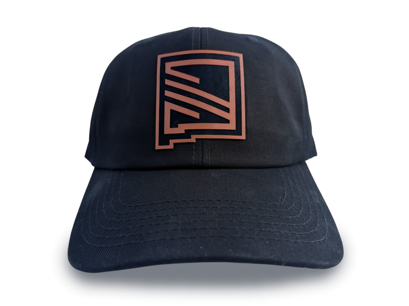 black hat with engraved leather patch